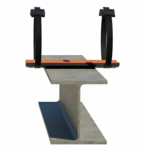 an image of a model of a smartpad assembly resting on a steel beam that represents a pipe support